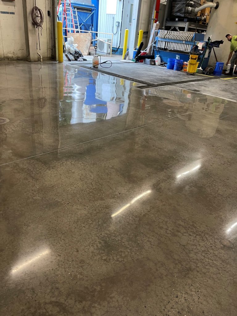 Concrete floor after removal of oil stains