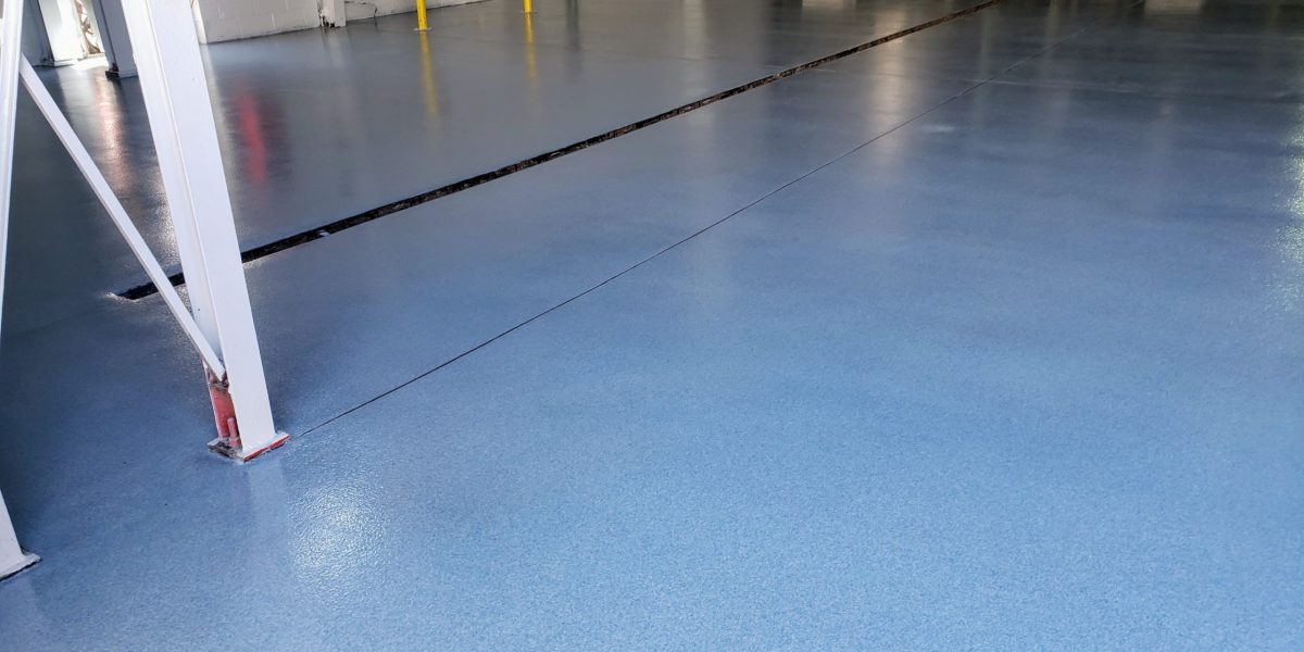 Slip and chemical resistant flooring